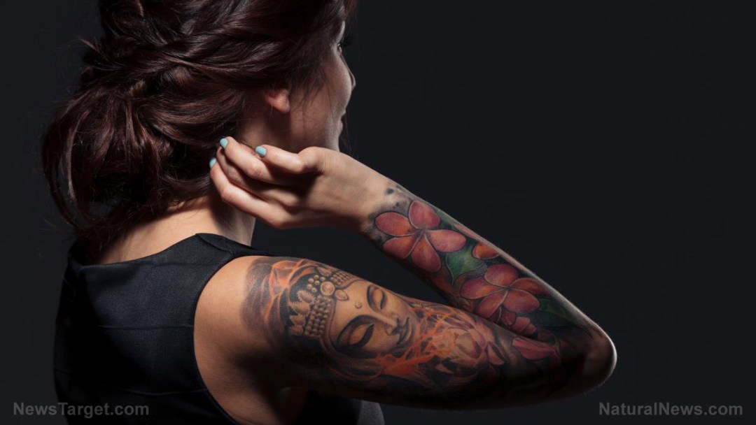 Back-View-Pretty-Young-Woman-Tattooed