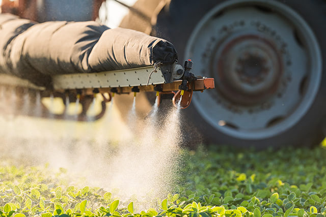 Tractor-spraying-pesticides-1