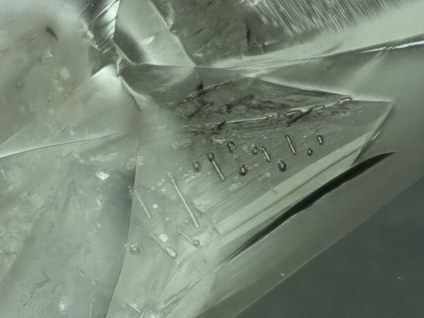 The matrix of straight lines appears at a specific frequency / distance / wavelength.